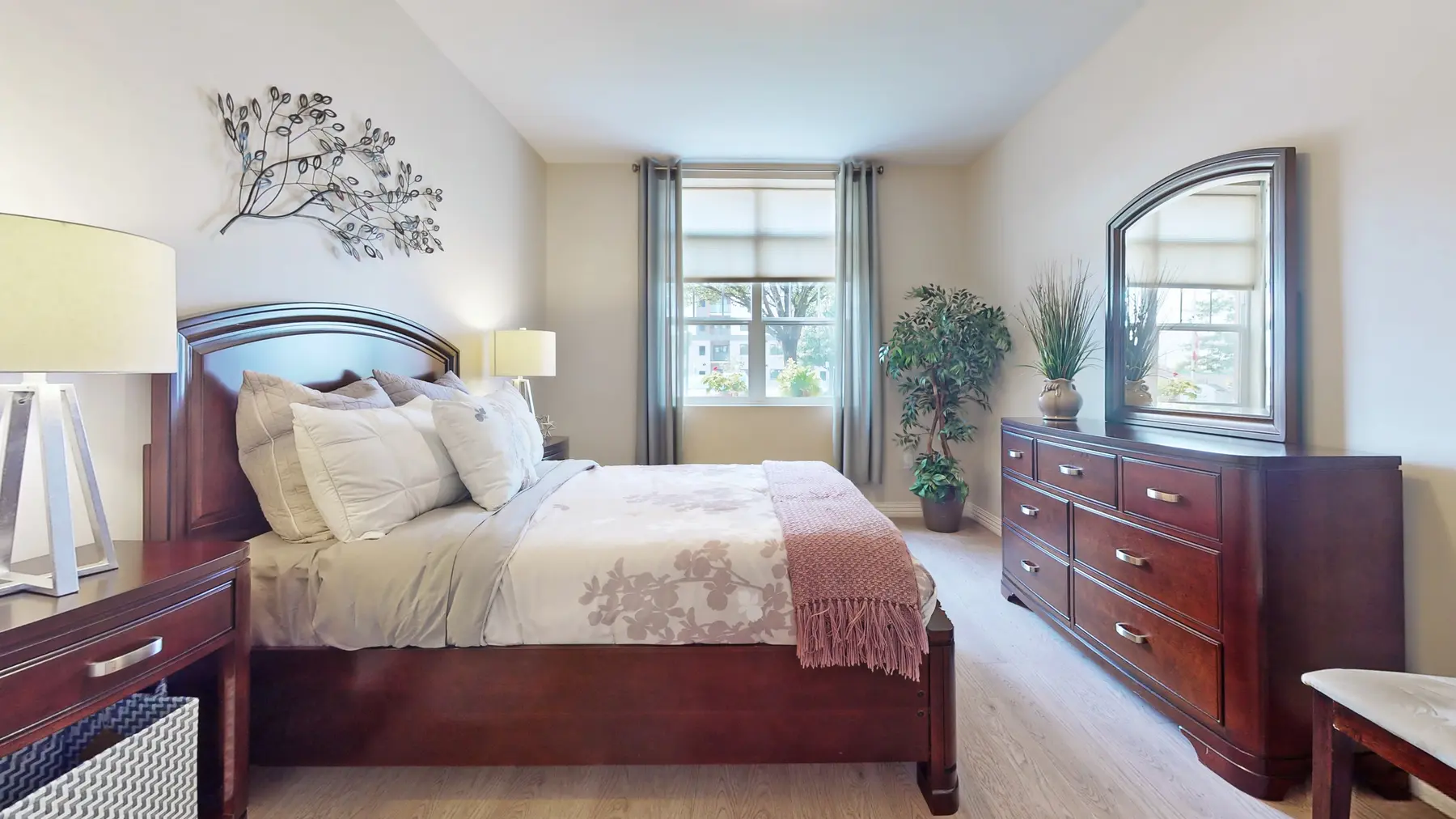 Model suite of bedroom at Chartwell Royal Oak Village